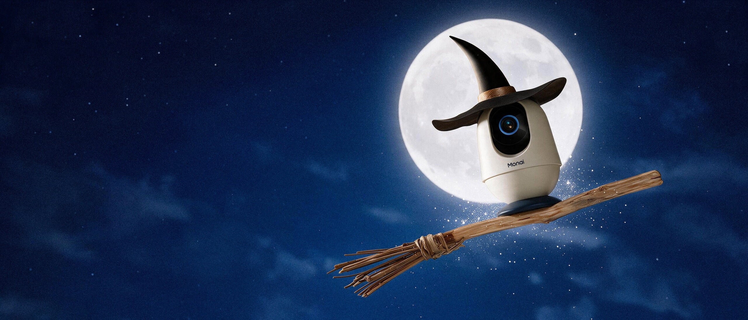 Monai baby monitor flying on a broom in front of the moon